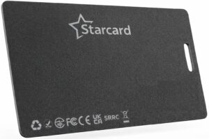 A rectangular black card labeled Starcard with various certification symbols and recycling logos at the bottom, and a slot on one edge, positioned against a white background.