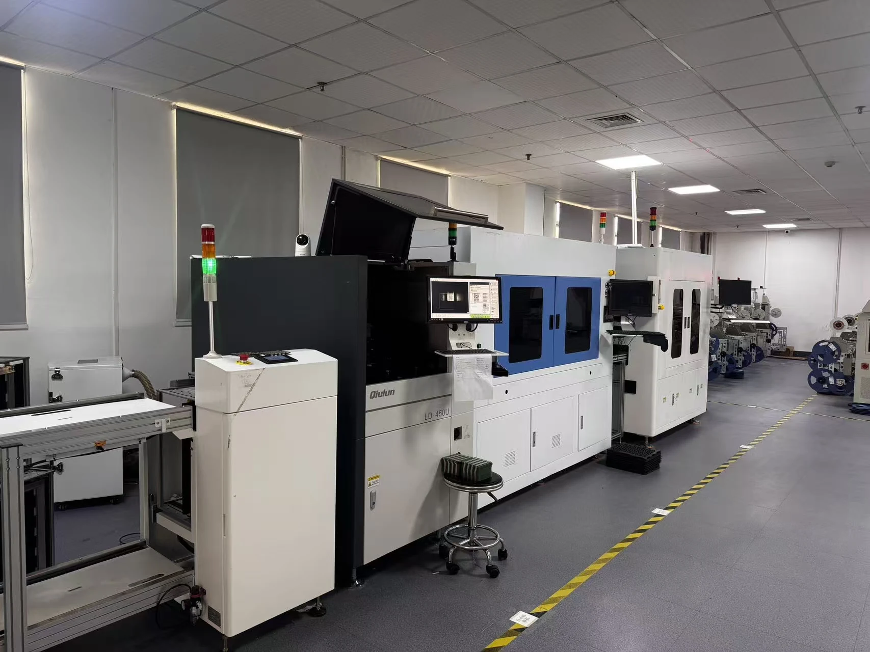Automated electronics production equipment in a clean manufacturing area